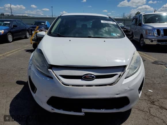 2013 Ford Fiesta S z VIN 3FADP4TJ5DM215407, wystawiony jako Copart lot #55306645 z przebiegiem 91 942 mil mil oraz Szkoda całkowita • Salvage title. Historia ofert i sprzedaży dostępna na DreamBid. Obrazek 5.