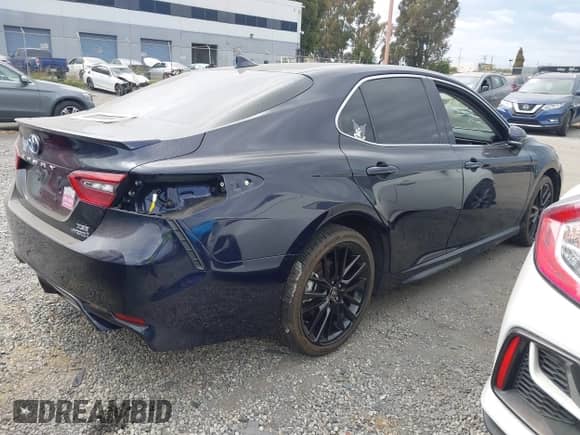 2022 Toyota Camry Hybrid XSE с VIN 4T1K31AK6NU571803, выставлен на аукционе IAAI как лот 42348549 с пробегом 15 263 миль миль и . История ставок и продаж доступна на DreamBid. Изображение 4.