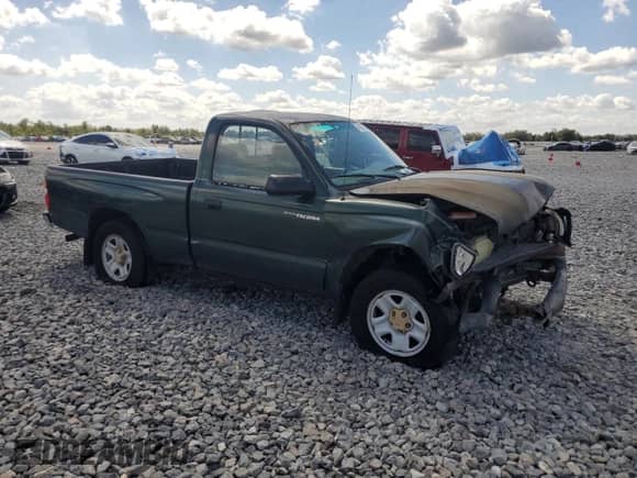 2002 Toyota Tacoma с VIN 5TENL42NX2Z025973, выставлен на аукционе Copart как лот 84580115 с пробегом 289 670 миль миль и Списание • Salvage title. История ставок и продаж доступна на DreamBid. Изображение 4.