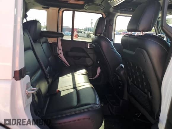 2022 Jeep Wrangler Unlimited Rubicon 392 с VIN 1C4JJXSJ8NW102697, выставлен на аукционе Copart как лот 67171155 с пробегом 34 094 миль миль и Списание • Salvage title. История ставок и продаж доступна на DreamBid. Изображение 11.