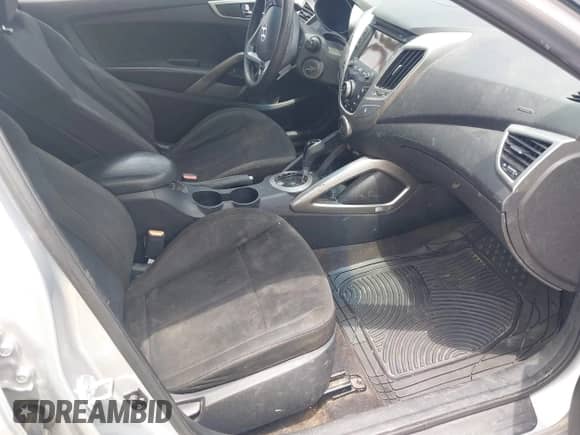 2014 Hyundai Veloster с VIN KMHTC6AD7EU184048, выставлен на аукционе IAAI как лот 42904514 с пробегом 191 749 миль миль и . История ставок и продаж доступна на DreamBid. Изображение 5.