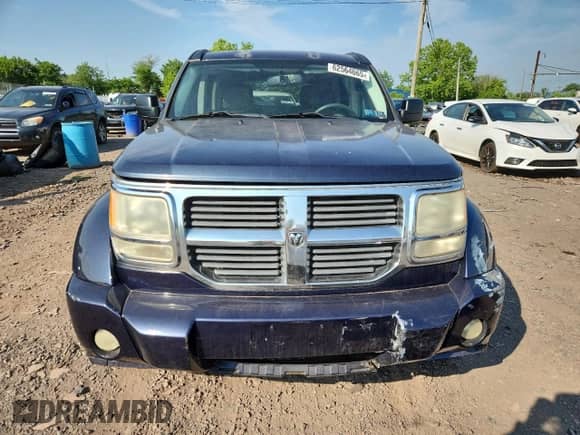 2008 Dodge Nitro SLT with VIN 1D8GU58K28W145542, listed as a Copart auction lot 62564065 with 210,778 mi miles and Salvage title. Bid and sale history available at DreamBid. Image 5.