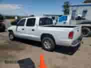 2001 Dodge Dakota Sport with VIN 1B7GL2AX61S222402, listed as a Copart auction lot 67203985 with 177,726 mi miles and Salvage title. Bid and sale history available at DreamBid. Image 2.