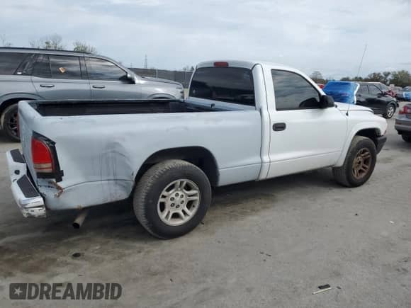 2004 Dodge Dakota z VIN 1D7FL16K34S621135, wystawiony jako Copart lot #46485985 z przebiegiem 202 197 mil mil oraz Szkoda całkowita • Salvage title. Historia ofert i sprzedaży dostępna na DreamBid. Obrazek 3.