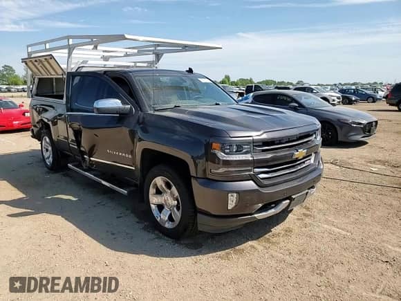2016 Chevrolet Silverado 1500 LTZ с VIN 1GCVKSEC2GZ226741, выставлен на аукционе Copart как лот 65211135 с пробегом 93 864 миль миль и Списание • Salvage title. История ставок и продаж доступна на DreamBid. Изображение 13.