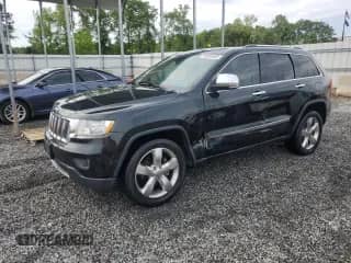 2012 Jeep Grand Cherokee Limited z VIN 1C4RJEBG5CC270873, wystawiony jako Copart lot #55069595 z przebiegiem 148 801 mil mil oraz Szkoda całkowita • Salvage title. Historia ofert i sprzedaży dostępna na DreamBid. Obrazek 1.