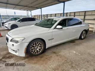 2013 BMW 7 Series 740Li with VIN WBAYE4C55DD137305, listed as a Copart auction lot 71267875 with 143,177 mi miles and Salvage title. Bid and sale history available at DreamBid. Image 1.