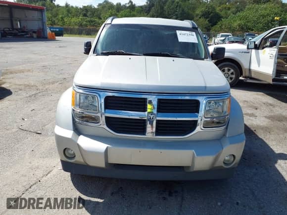 2008 Dodge Nitro SXT z VIN 1D8GT28K78W274510, wystawiony jako IAAI lot #43472330 z przebiegiem 200 084 mil mil oraz . Historia ofert i sprzedaży dostępna na DreamBid. Obrazek 6.