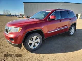 2011 Jeep Grand Cherokee Laredo z VIN 1J4RR4GG4BC537831, wystawiony jako Copart lot #90458005 z przebiegiem 322 580 mil mil oraz Szkoda całkowita • Salvage title. Historia ofert i sprzedaży dostępna na DreamBid. Obrazek 1.