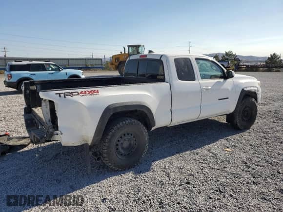2022 Toyota Tacoma SR z VIN 3TYSZ5ANXNT090384, wystawiony jako Copart lot #80906685 z przebiegiem Nie podano mil oraz Szkoda całkowita • Salvage title. Historia ofert i sprzedaży dostępna na DreamBid. Obrazek 3.