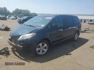 2012 Toyota Sienna with VIN 5TDZK3DC4CS237227, listed as a Copart auction lot 68947005 with 219,993 mi miles and Salvage title. Bid and sale history available at DreamBid. Image 1.
