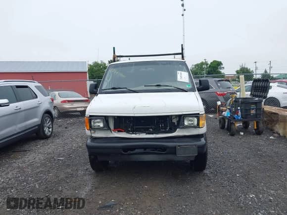 2003 Ford Econoline Cargo with VIN 1FTNE24W13HA46279, listed as a IAAI auction lot 42482660 with 250,712 mi miles and . Bid and sale history available at DreamBid. Image 6.