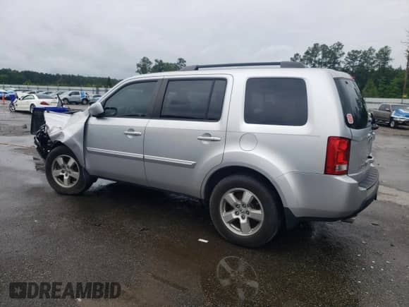 2011 Honda Pilot EX-L z VIN 5FNYF3H71BB033923, wystawiony jako Copart lot #56649305 z przebiegiem 132 304 mil mil oraz Szkoda całkowita • Salvage title. Historia ofert i sprzedaży dostępna na DreamBid. Obrazek 2.