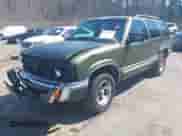 2001 Chevrolet Blazer LT with VIN 1GNCS13WX12137232, listed as a IAAI auction lot 41670172 with Not provided miles and . Bid and sale history available at DreamBid. Image 2.