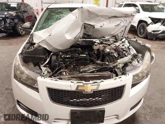 2014 Chevrolet Cruze LS with VIN 1G1PB5SH7E7143110, listed as a IAAI auction lot 42486209 with 92,277 mi miles and . Bid and sale history available at DreamBid. Image 6.