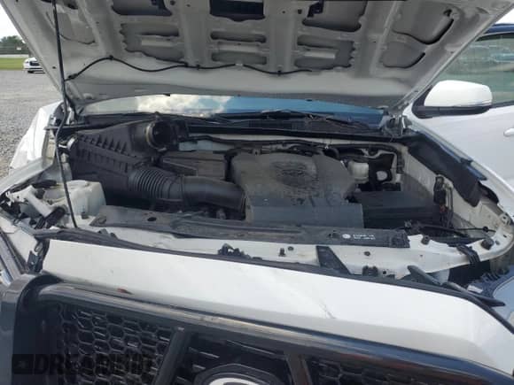 2018 Toyota Tacoma SR with VIN 5TFCZ5ANXJX162902, listed as a Copart auction lot 68464895 with 105,750 mi miles and Salvage title. Bid and sale history available at DreamBid. Image 11.