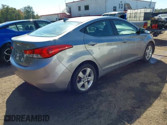 2013 Hyundai Elantra GLS with VIN KMHDH4AE0DU928848, listed as a IAAI auction lot 43355279 with 130,931 mi miles and . Bid and sale history available at DreamBid. Image 4.