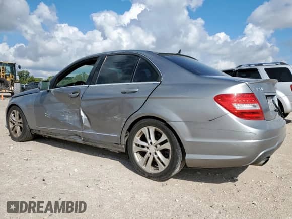 2014 Mercedes-Benz C 250 Sport with VIN WDDGF4HB0EG254273, listed as a Copart auction lot 70661895 with 117,284 mi miles and Salvage title. Bid and sale history available at DreamBid. Image 2.