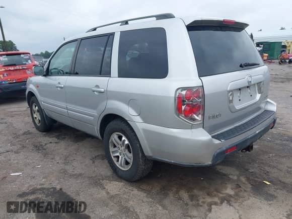 2006 Honda Pilot EX-L z VIN 2HKYF18676H505738, wystawiony jako IAAI lot #43023107 z przebiegiem 186 550 mil mil oraz . Historia ofert i sprzedaży dostępna na DreamBid. Obrazek 3.