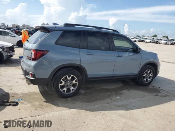 2023 Honda Passport TrailSport с VIN 5FNYF8H60PB020317, выставлен на аукционе Copart как лот 61548195 с пробегом 24 621 миль миль и Списание • Salvage title. История ставок и продаж доступна на DreamBid. Изображение 3.