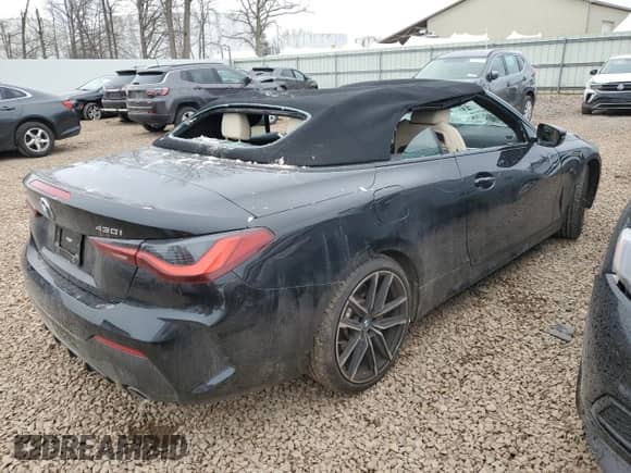2023 BMW 4 Series 430i xDrive with VIN WBA43AT08PCM90476, listed as a Copart auction lot 50727785 with 11,677 mi miles and Salvage title. Bid and sale history available at DreamBid. Image 3.