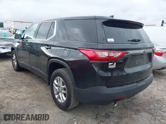 2020 Chevrolet Traverse LS z VIN 1GNERFKW9LJ106467, wystawiony jako IAAI lot #42882907 z przebiegiem 156 957 mil mil oraz . Historia ofert i sprzedaży dostępna na DreamBid. Obrazek 3.