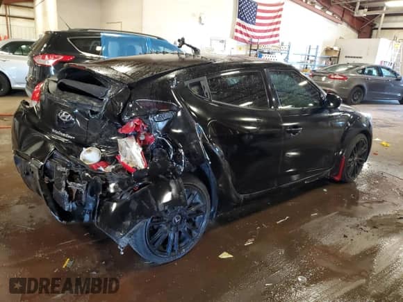 2012 Hyundai Veloster w/Gray Int z VIN KMHTC6AD3CU052773, wystawiony jako Copart lot #70096015 z przebiegiem 154 233 mil mil oraz Czysty tytuł • Clean title. Historia ofert i sprzedaży dostępna na DreamBid. Obrazek 3.