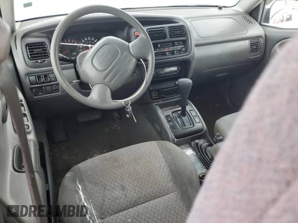 2004 Chevrolet Tracker с VIN 2CNBJ134746912028, выставлен на аукционе Copart как лот 89371155 с пробегом 144 593 миль миль и Списание • Salvage title. История ставок и продаж доступна на DreamBid. Изображение 8.