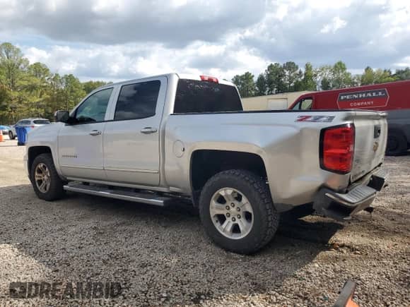 2015 Chevrolet Silverado 1500 LT with VIN 3GCUKREC4FG477151, listed as a Copart auction lot 82183335 with 182,819 mi miles and Salvage title. Bid and sale history available at DreamBid. Image 2.