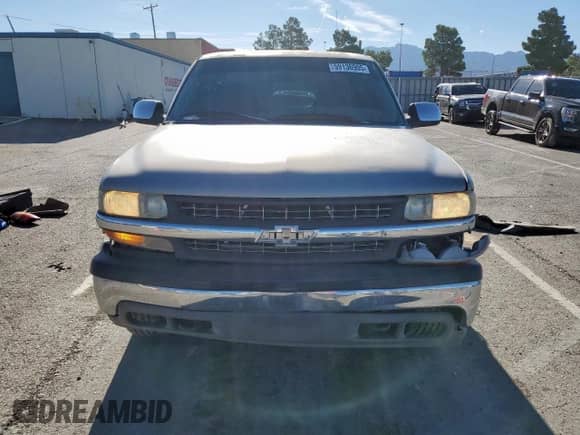 1999 Chevrolet Silverado 1500 LS z VIN 1GCEK19V8XE216342, wystawiony jako Copart lot #80629585 z przebiegiem 163 938 mil mil oraz Szkoda całkowita • Salvage title. Historia ofert i sprzedaży dostępna na DreamBid. Obrazek 5.
