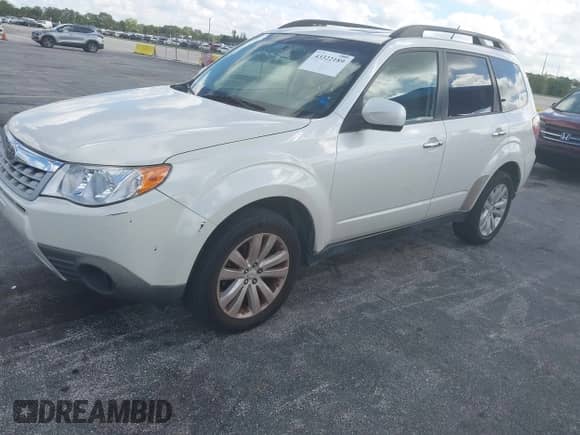 2013 Subaru Forester X Premium z VIN JF2SHADC9DH402670, wystawiony jako IAAI lot #43322189 z przebiegiem 93 140 mil mil oraz . Historia ofert i sprzedaży dostępna na DreamBid. Obrazek 2.