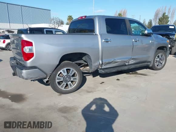 2019 Toyota Tundra SR5 with VIN 5TFAY5F1XKX817867, listed as a IAAI auction lot 41839736 with 61,102 mi miles and . Bid and sale history available at DreamBid. Image 4.