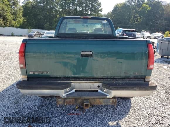 1997 GMC Sierra 1500 z VIN 1GTEK19R4VE531574, wystawiony jako Copart lot #64047355 z przebiegiem 221 815 mil mil oraz Szkoda całkowita • Salvage title. Historia ofert i sprzedaży dostępna na DreamBid. Obrazek 6.