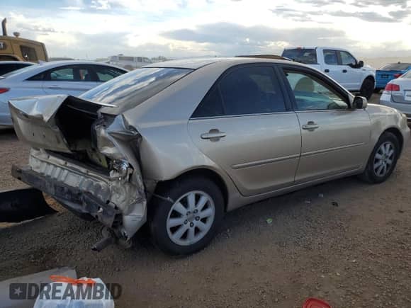 2003 Toyota Camry LE z VIN 4T1BF30K73U057881, wystawiony jako Copart lot #80207065 z przebiegiem 240 172 mil mil oraz Szkoda całkowita • Salvage title. Historia ofert i sprzedaży dostępna na DreamBid. Obrazek 3.