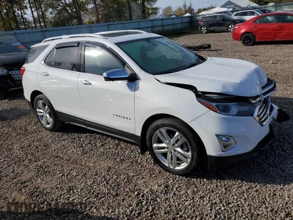 2019 Chevrolet Equinox Premier with VIN 3GNAXYEX5KS678623, listed as a Copart auction lot 87048825 with 73,401 mi miles and Salvage title. Bid and sale history available at DreamBid. Image 4.