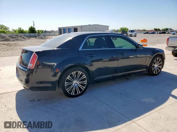 2014 Chrysler 300 S with VIN 2C3CCABT7EH119561, listed as a Copart auction lot 53995655 with 131,077 mi miles and Salvage title. Bid and sale history available at DreamBid. Image 3.