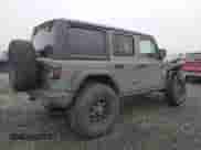 2022 Jeep Wrangler Unlimited Willys with VIN 1C4HJXDM1NW241284, listed as a Copart auction lot 83336744 with Not provided miles and Salvage title. Bid and sale history available at DreamBid. Image 3.