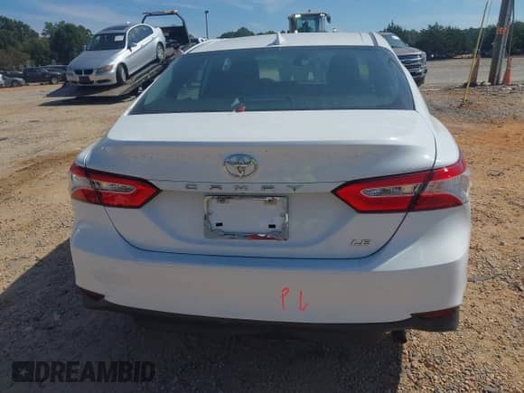 2020 Toyota Camry LE z VIN 4T1L11AK2LU999293, wystawiony jako IAAI lot #43202655 z przebiegiem 52 070 mil mil oraz . Historia ofert i sprzedaży dostępna na DreamBid. Obrazek 16.