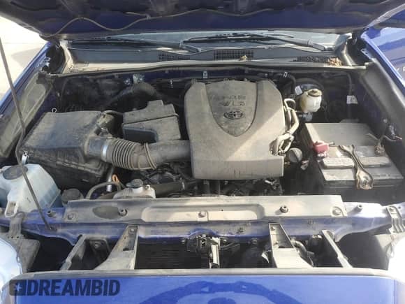 2022 Toyota Tacoma SR z VIN 3TYSZ5AN0NT091172, wystawiony jako Copart lot #56365785 z przebiegiem Nie podano mil oraz Szkoda całkowita • Salvage title. Historia ofert i sprzedaży dostępna na DreamBid. Obrazek 11.