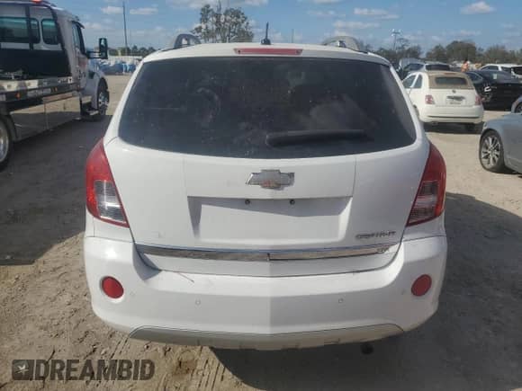 2014 Chevrolet Captiva Sport LTZ с VIN 3GNAL4EK2ES554953, выставлен на аукционе Copart как лот 77829244 с пробегом Не указан миль и Списание • Salvage title. История ставок и продаж доступна на DreamBid. Изображение 6.