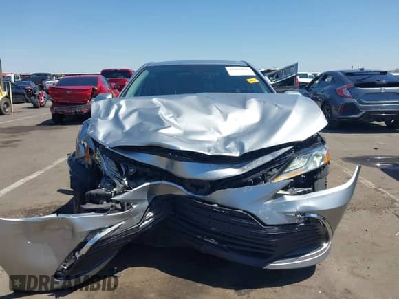 2021 Toyota Camry Hybrid XLE with VIN 4T1F31AK2MU547062, listed as a IAAI auction lot 42405027 with 170,899 mi miles and . Bid and sale history available at DreamBid. Image 6.