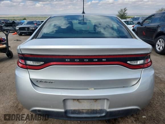 2013 Dodge Dart SE with VIN 1C3CDFAA2DD267171, listed as a Copart auction lot 85929445 with 131,998 mi miles and Salvage title. Bid and sale history available at DreamBid. Image 6.