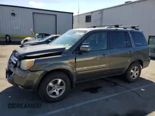 2006 Honda Pilot EX-L with VIN 2HKYF18546H521158, listed as a Copart auction lot 82399125 with 180,921 mi miles and Salvage title. Bid and sale history available at DreamBid. Image 1.