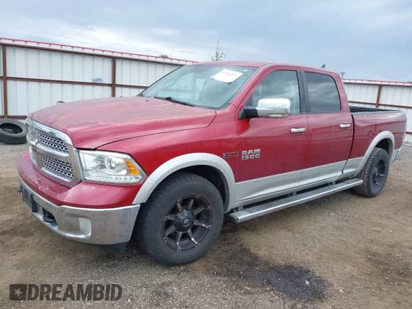2014 Ram 1500 Laramie z VIN 1C6RR7VM5ES297951, wystawiony jako IAAI lot #42361374 z przebiegiem 210 193 mil mil oraz . Historia ofert i sprzedaży dostępna na DreamBid. Obrazek 2.