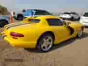 2002 Dodge Viper RT/10 z VIN 1B3ER65E42V101682, wystawiony jako Copart lot #69194365 z przebiegiem Nie podano mil oraz Szkoda całkowita • Salvage title. Historia ofert i sprzedaży dostępna na DreamBid. Obrazek 3.