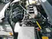 2014 Ford Focus Titanium z VIN 1FADP3N29EL438598, wystawiony jako IAAI lot #43374118 z przebiegiem 110 255 mil mil oraz . Historia ofert i sprzedaży dostępna na DreamBid. Obrazek 16.