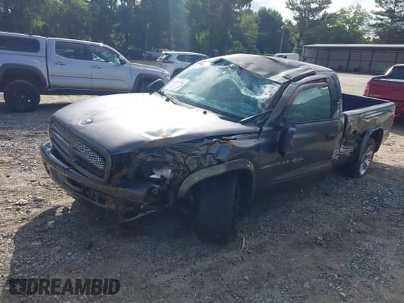 2002 Dodge Dakota with VIN 1B7GL32Z02S676880, listed as a IAAI auction lot 42982180 with 109,819 mi miles and . Bid and sale history available at DreamBid. Image 18.