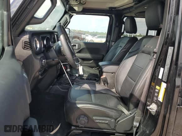 2023 Jeep Wrangler Sahara z VIN 1C4JJXP68PW696148, wystawiony jako Copart lot #89850255 z przebiegiem 44 050 mil mil oraz Szkoda całkowita • Salvage title. Historia ofert i sprzedaży dostępna na DreamBid. Obrazek 7.