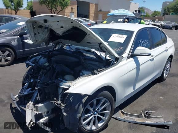 2016 BMW 3 Series 320i with VIN WBA8A9C51GK618922, listed as a IAAI auction lot 42707824 with 165,003 mi miles and . Bid and sale history available at DreamBid. Image 2.