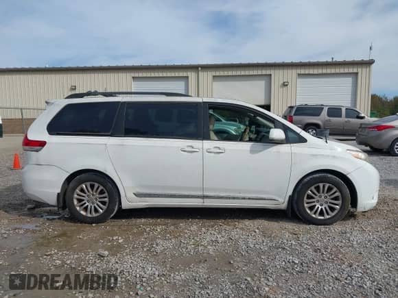 2012 Toyota Sienna XLE with VIN 5TDYK3DC4CS231407, listed as a IAAI auction lot 43531271 with 382,802 mi miles and . Bid and sale history available at DreamBid. Image 13.